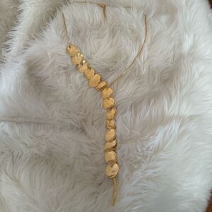 Unique gold plunging necklace